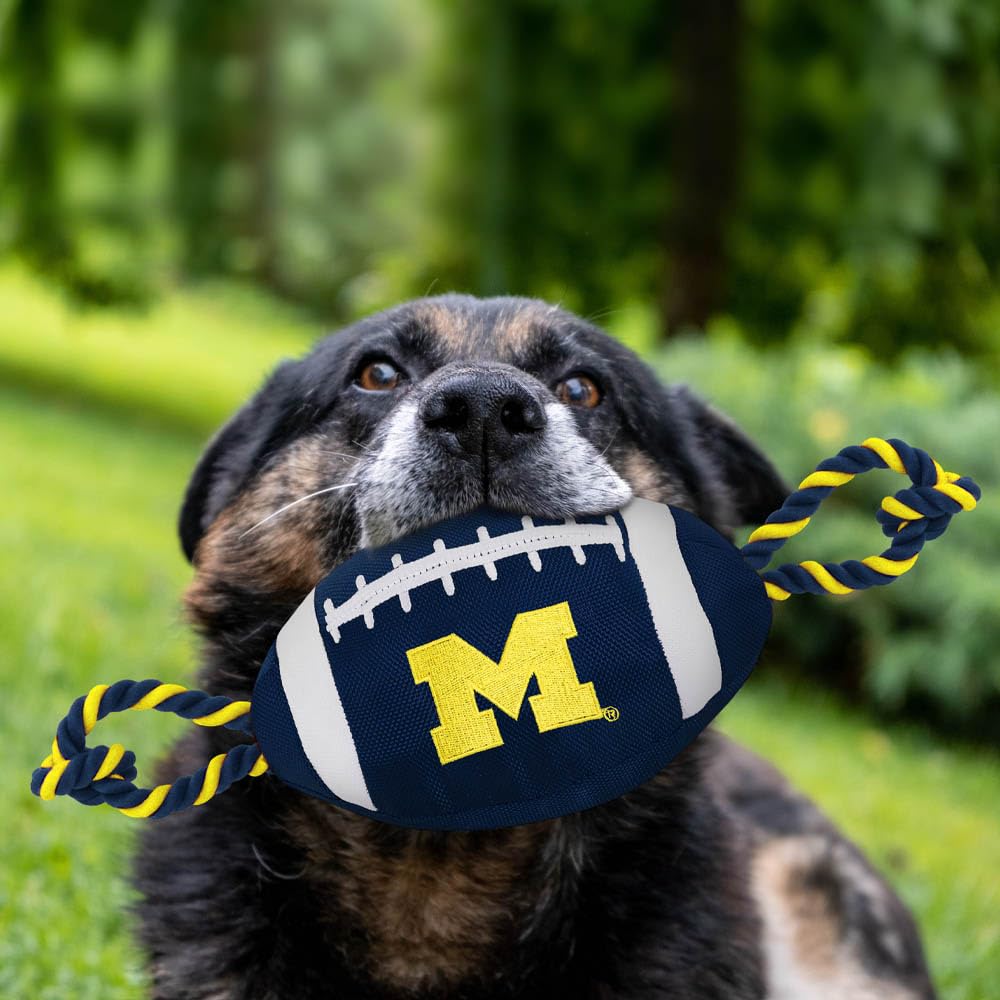 Pets First NCAA Michigan Wolverines Football Dog Toy, Tough Quality Nylon Materials, Strong Pull Ropes, Inner Squeaker, Collegia