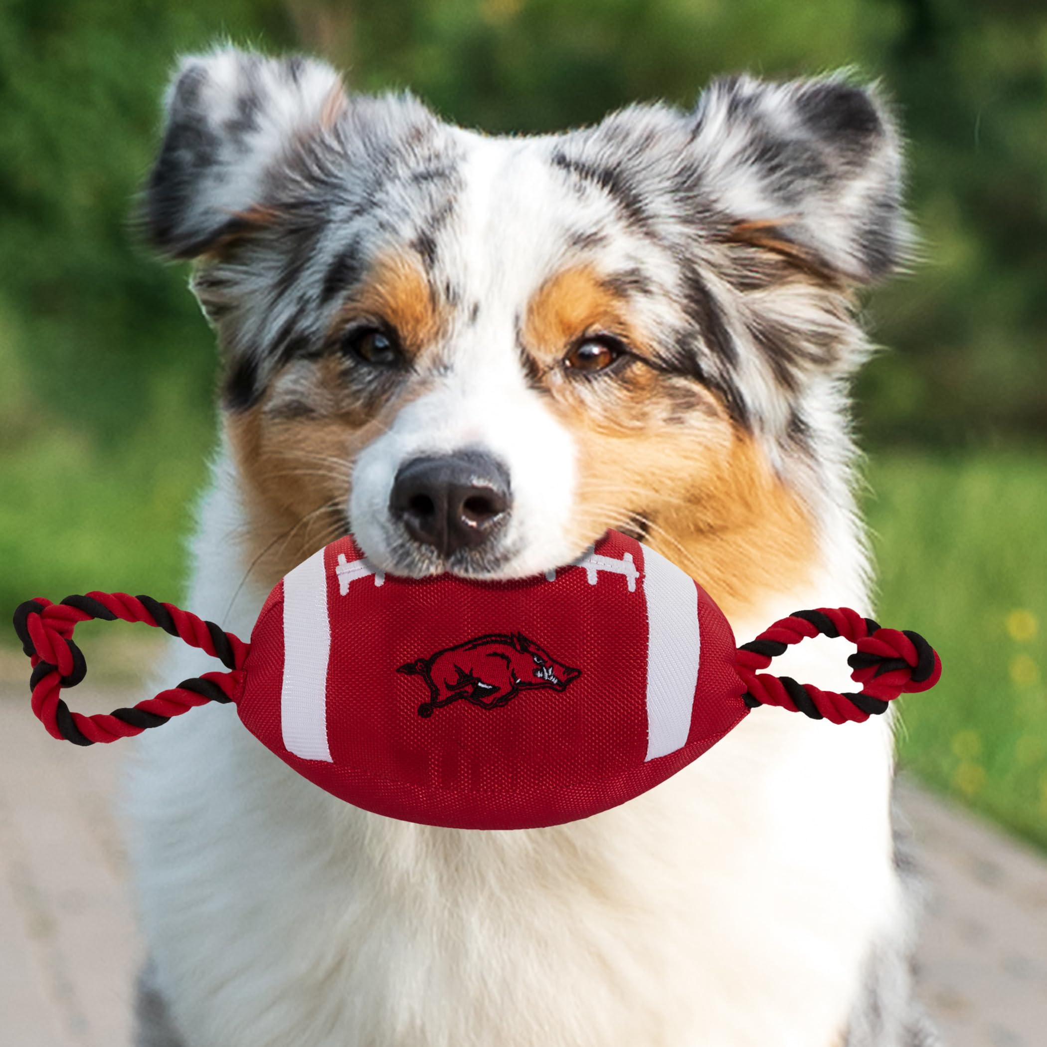 Pets First NCAA Arkansas Razorbacks Football Dog Toy, Tough Quality Nylon Materials, Strong Pull Ropes, Inner Squeaker, Collegia