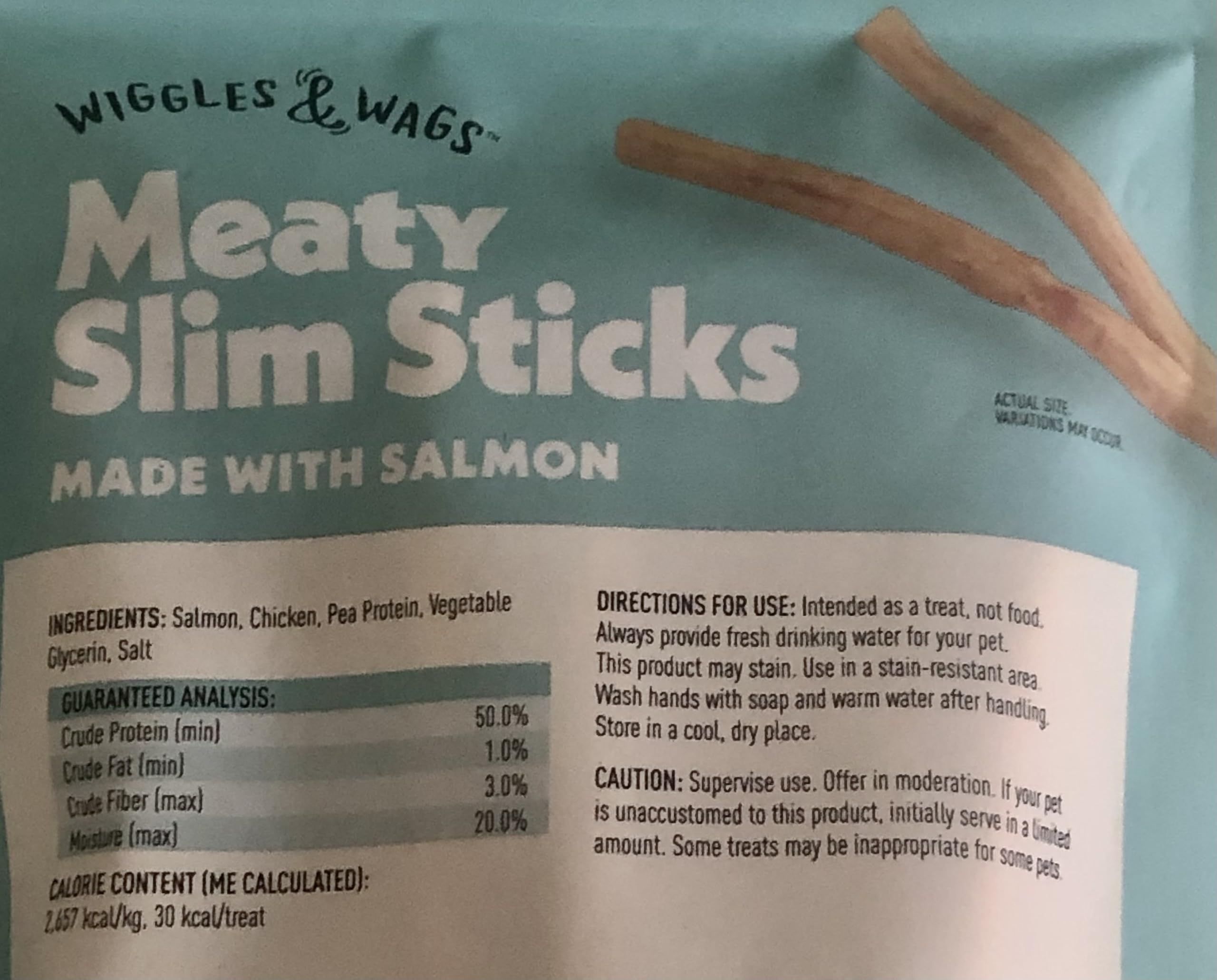 Wiggles & Wags Meaty Slim Sticks Made with Salmon Dog Treats. One Six Ounce Bag. One Biggs Dog Waste Roll.