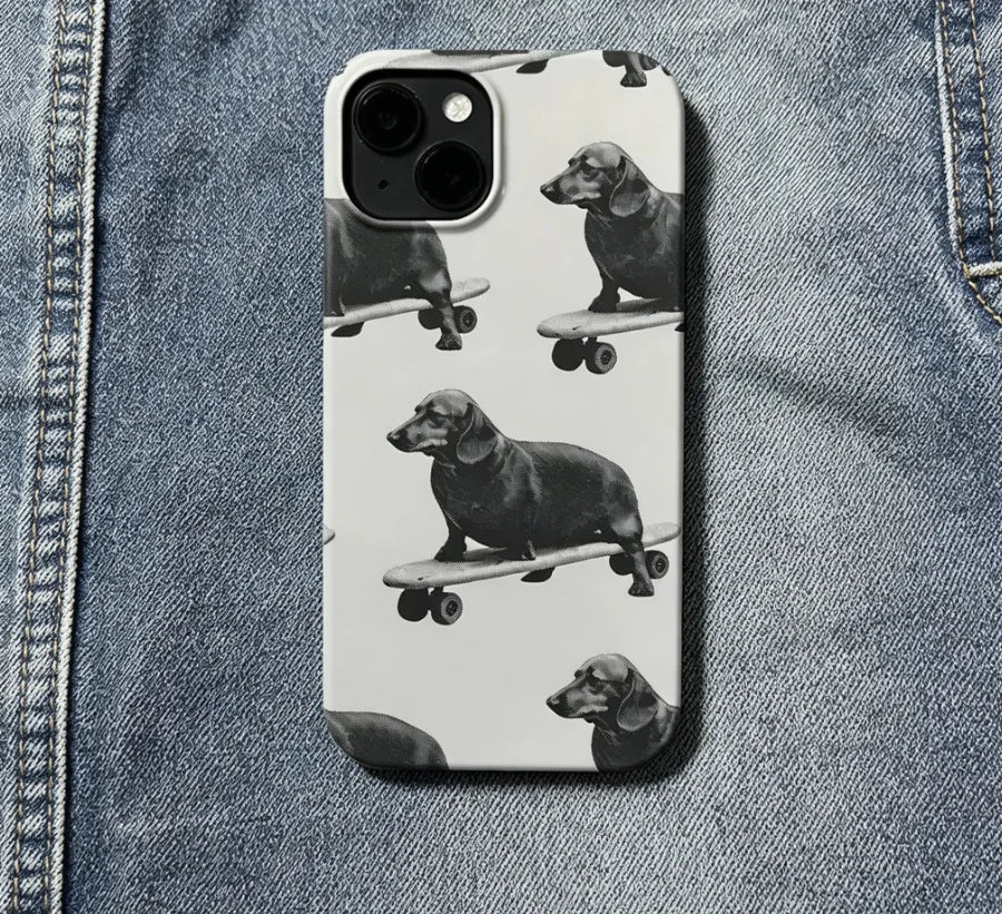 Playful Dachshund Skateboard Black & White Dog Skating Phone Case For iPhone 17 Air 16 E 15 14 13 12 11 Pro Max Plus Cover